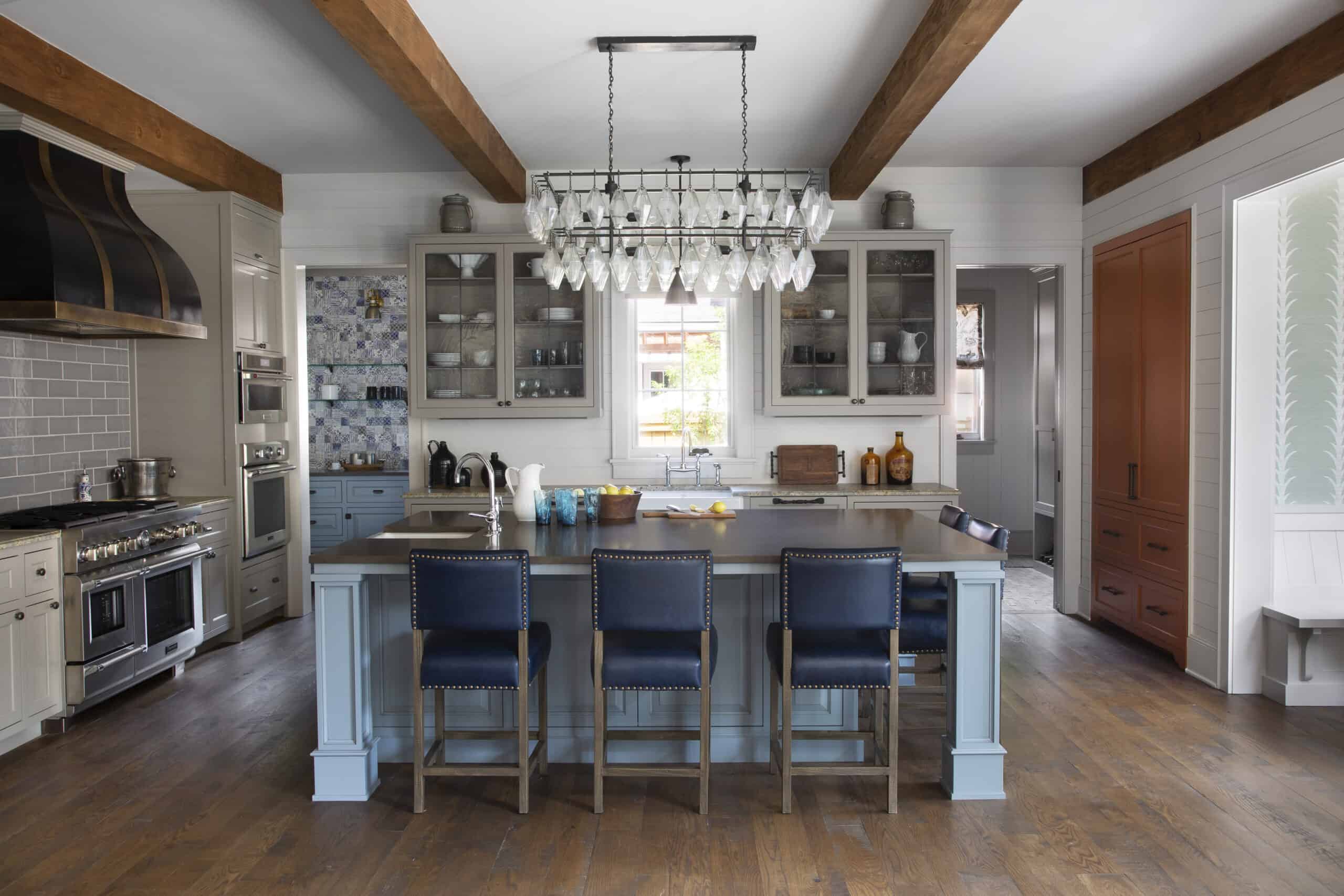 Kitchen with blue chairs. Duet Design Group Denver Colorado Interior Design
